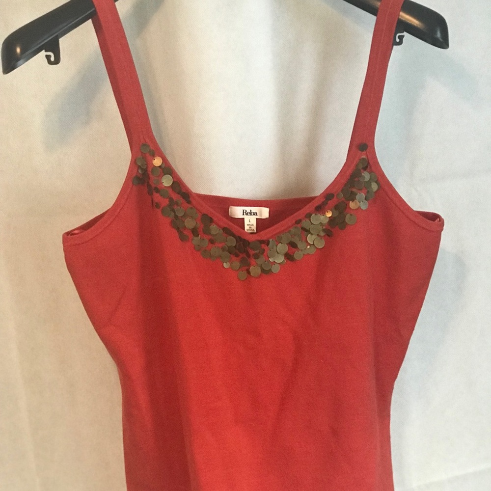 Reba burnt orange 84% silk shell.